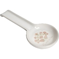 Vintage lepelhouder met bloemenmotief