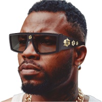 Oversized zonnebril met gouden dollarteken