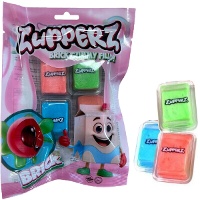 Kubus van gummimelk gevuld met 18 gr gelei - 4 stuks