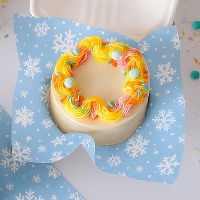 Vetvrij papier met sneeuwvlokprint 25 x 25 cm - 50 stuks