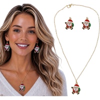 Set met ketting en oorbellen met kerstmanmotief